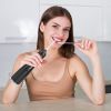 Portable Water Dental Flosser Cordless Rechargeable Dental Oral Irrigator IPX7 Waterproof Teeth Cleaner with 4 Modes 4 Nozzles 10.15oz Detachable Wate