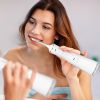Portable Water Dental Flosser Cordless Rechargeable Dental Oral Irrigator IPX7 Waterproof Teeth Cleaner with 4 Modes 4 Nozzles 10.15oz Detachable Wate